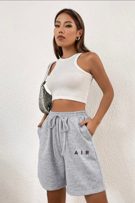 Kadın Rahat Kalıp Beli Lastikli Cepli Basklı Şort spr24srk52