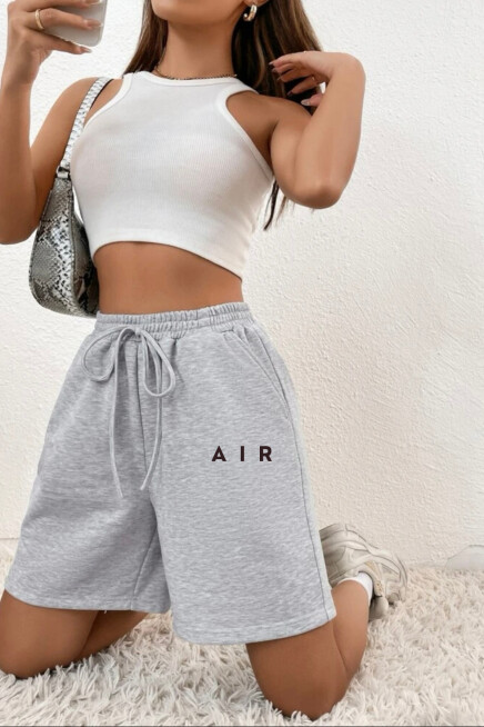 Kadın Rahat Kalıp Beli Lastikli Cepli Basklı Şort spr24srk52